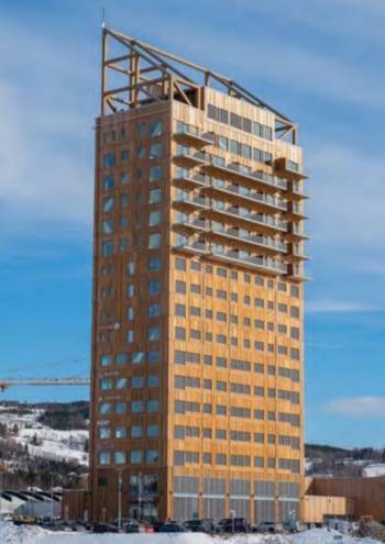 Mjøstårnet, Brumunddal, Norvegia: Attualmente si tratta del più alto edificio al mondo, realizzato in legno per un totale di 85,3 m distribuiti su 18 piani; © Nina Rundsveen.