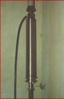 Figura 6 – Uno dei dispositivi SMAD inseriti in serie ai tiranti verticali di Fig. 5, all’interno del Campanile della Chiesa di San Giorgio in Trignano, per il suo restauro a causa del danneggiamento provocato dal terremoto di Reggio Emilia e Modena il 15 ottobre 1996
